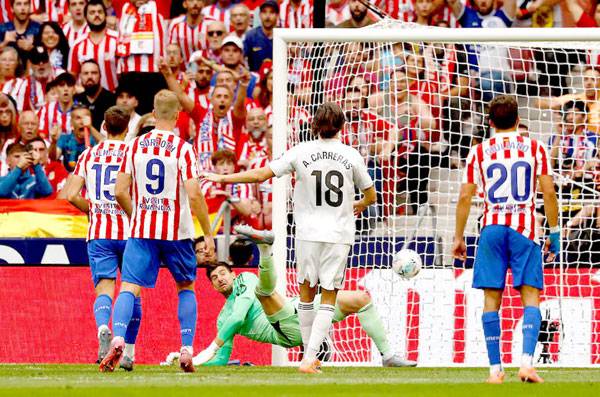 Alvarez double sparks Atletico comeback to stun leaders Real Madrid 5-2
